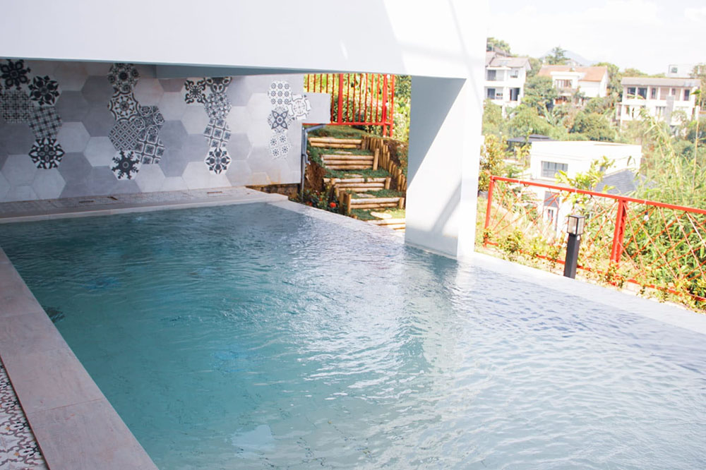 RUMAH MODERN BEACH HOUSE DGN SWIMMING POOL DI RESORT DAGO BDG